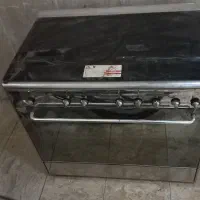 اجاق گاز پنج شعله فردار برند سینجر  درب شیشه ای