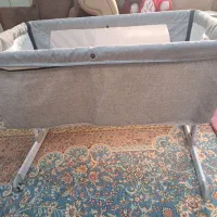 گهواره .لباس نوزاد ،ماشین عروسک همه باهم زیرقیمت