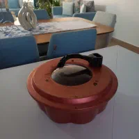 یک کیک پزدرحدنوودوعددقابلمه تفلون کاملانو