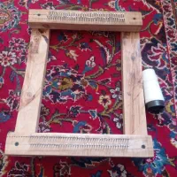 چوب داریه همراه نخ چله کشی