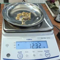 طلای آبشده و سکه به نرخ تابلو