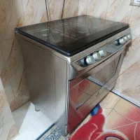 اجاق گاز فر دار فوق‌العاده کم کاکرد در حد آک