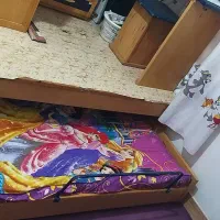 تخت دو طبقه همراه میز کامپوتر وکشوی لباس