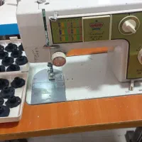 چرخ خیاطی وگلدوزی دکمه جا دکمه زن با میز