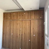 ساخت و نصب انواع کابینت و  کمد دیولری