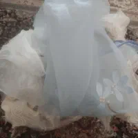 تعدادی تورپرده زیبابرادرست کردن کلیپس وغیره