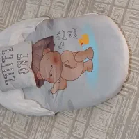پشبند نونو استفاده نشده به همراه کاور و بالش