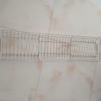 آب چکون داخل کابینت فلزی روکش استیل