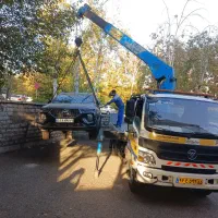 کفی خودروبر دکل‌دار و جرثقیل ۳ تن عنکبوتی.یدک کش