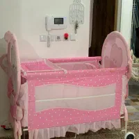 تخت گهواره نوزاد کودک تا ۶سالگی صورتی کنار مادر