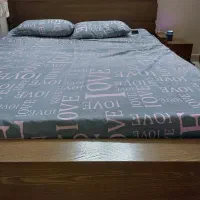 تخت دو نفره روکش چوب