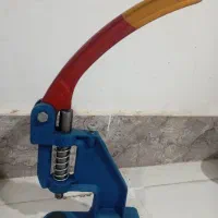 دستگاه پرس دکمه