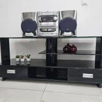 زیر تلویزیونی شیشه ای چوبی دو کشو تمیز