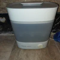 دستگاه استریل شیشه شیر
