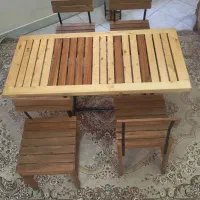 میز چوبی با چهار عدد صندلی چوبی