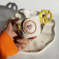 فنجان و بشقاب طرح خیاطی و گلدوزی تک نسخه و خاص