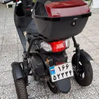 مکانیک برای اضافه کردن چرخ کمکی موتور
