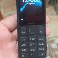 گوشی نوکیا ۱۲۵ با کارتون و شارژر