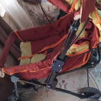 کالسکه بچه به همراه ساک و آغوشی و...
