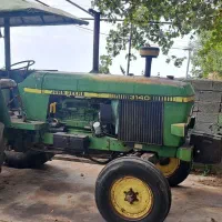 تراکتور شش سیلندر جاندیر۳۱۴۰با ادوات کشاورزی مدل۶۴