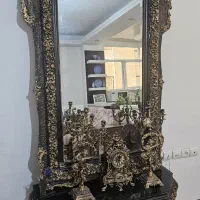 آینه شمعدان و ساعت