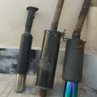 منبع اگزوز ۷۱۰ سالم و مرتب و یک جفت فنر پژو