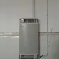 بخاری برقی گازی