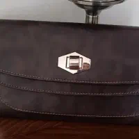 کیف دستی/دوشی چرم قفل‌دار با بند زنجیری  19*33