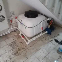 نصب پمپ و منبع  لوله کشی آب و فاضلاب