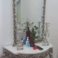 خریدار و فروشنده آینه‌ کنسول و گنجه و ساعت برنزی