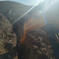 راننده بیل مکانیکی هستم
