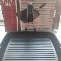 ماهیتابه چدن نو با کارتن