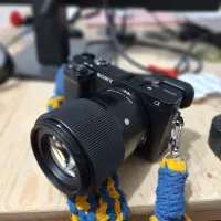 دوربین عکاسی 6400 با لنز سیگما سونی ۳۰ اف ۱.۴