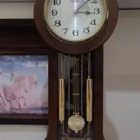 ساعت دیواری چوبی قدیمی