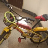 دوچرخه ۱۶ با کمکی