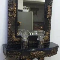 اینه و شمعدان و ویترین