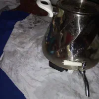 دو عدد کتری. ویک اجاق پلو پز سایز کوچک
