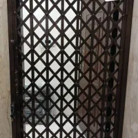 حفاظ درب آکاردئونی سفارشی ساز پنجره نرده (تهران)