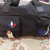 ساک باشگاه و دمبل