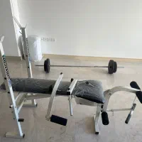 میز پرس سینه و هالتر با وزنه ۱۵ کیلویی