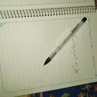 خودکار ودفتر نو استفاده نشده