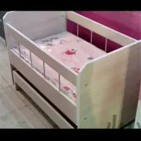 تخت گهواره ای نوزادی