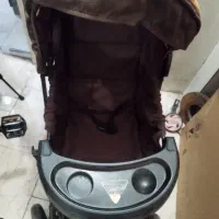 کالسکه در حد نو قهوه ای رنگ