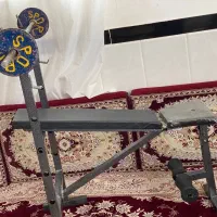 دمبل و دستگاه پرس در حد صفر