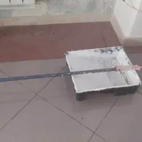 غلتک نقاشی و ظرف