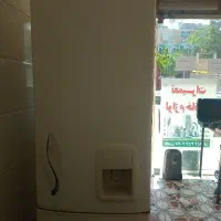 تعمیرلوازم خانگی یخچال جاروبرقی چرخ خیاطی لباسشویی