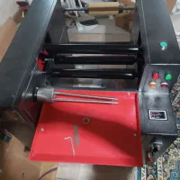 دستگاه رول سفره یکبار مصرف سه کاره