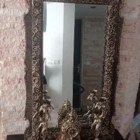 آینه و شمعدان وساعت