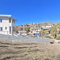 یک قطعه زمین ۳۱۰ متری با بر ۱۱ با مجوز ساخت آماده