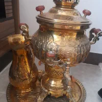 سماور طلایی نو و سالم  با سینی و پارچ